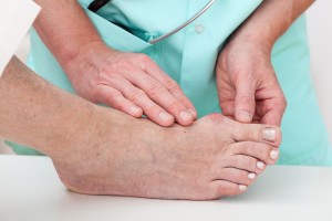 checking a diabetic foot